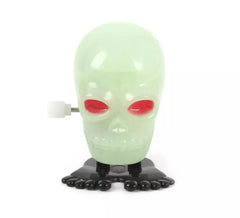 Figura Calavera luminiscente de 5x4 cm