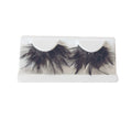 Pestañas de plumas con pegamento