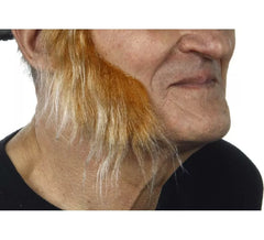 Patillas anchas con pelo castaño canoso