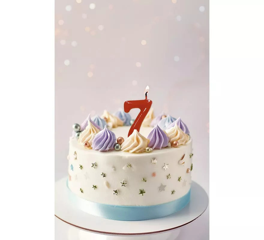 Translation missing: es.Vela roja con el número 7 para cumpleaños